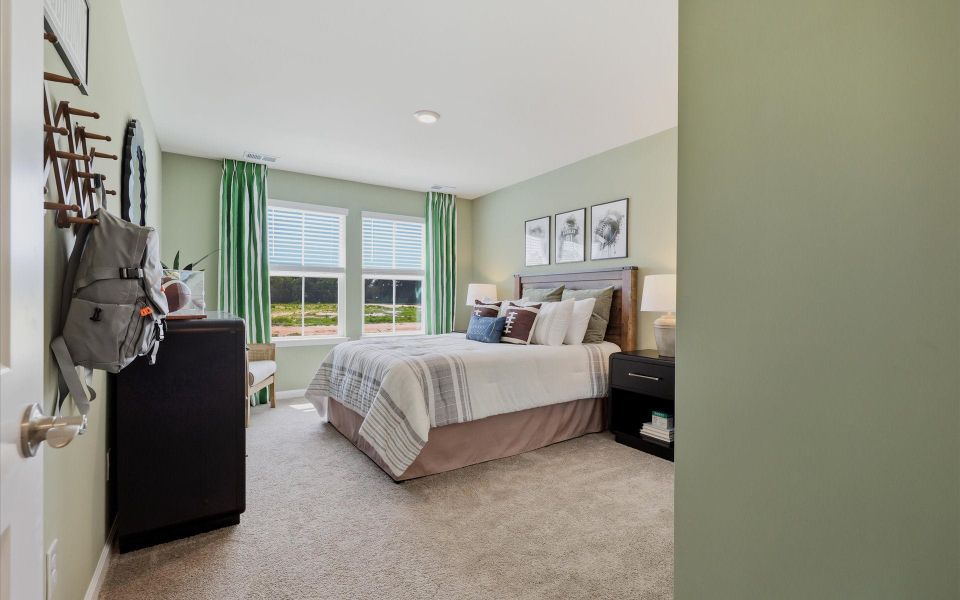 Representative furnished interior of a home built from the The Waterlily by Chesapeake Homes in Riverwalk Pointe at Mallory Creek - Townhomes, Leland (Image 21). Representative furnished interior of a home built from the The Waterlily by Chesapeake Homes in Riverwalk Pointe at Mallory Creek - Townhomes, Leland (Image 21).