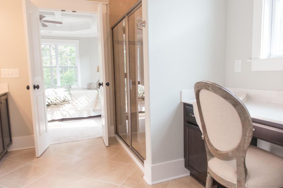 Representative furnished interior of a home built from the Ansley by Bill Clark Homes in The Sanctuary at Sunset Beach, Sunset Beach (Image 32).