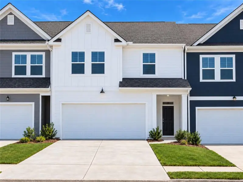 Front exterior of a new home in Walden Park – The Collection, Jonesboro, GA, highlighting curb appeal (Image 1). Front exterior of a new home in Walden Park – The Collection, Jonesboro, GA, highlighting curb appeal (Image 1).