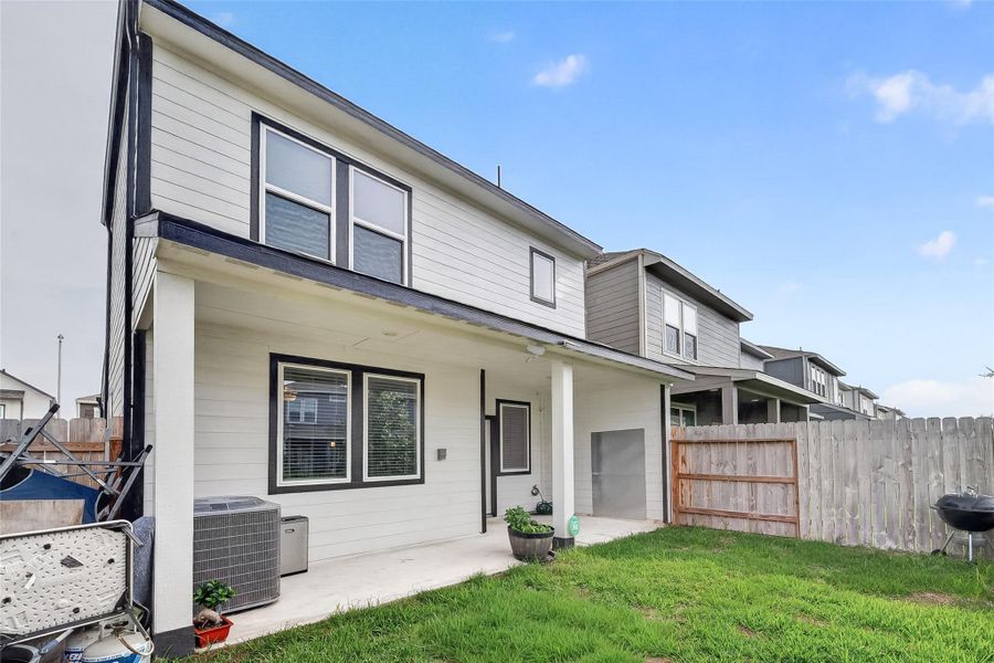 Exterior details and patio area of a home in McClendon Park Village, Houston (Image 28).