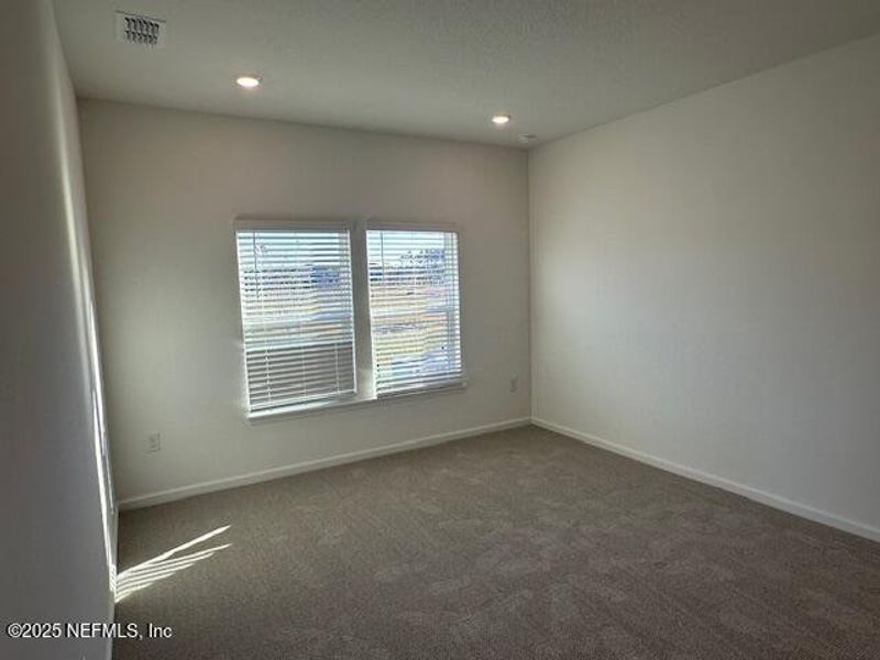 Spacious, unfurnished interior of a new home in Brook Forest - Villas, St. Augustine (Image 12).