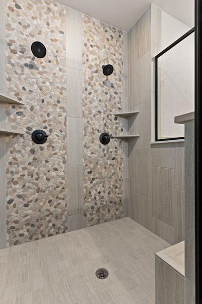 Bathroom with tiled shower Bathroom with tiled shower