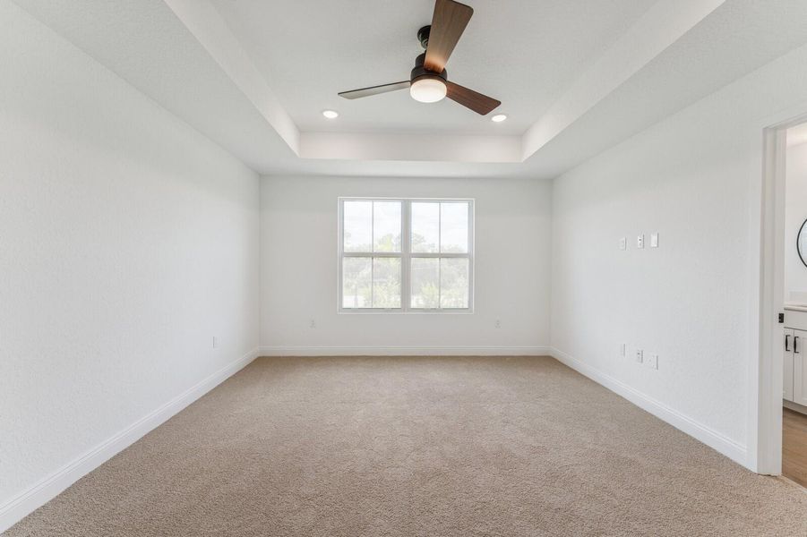 Front exterior of a new home in Salerno Reserve Townhomes, Stuart, FL, highlighting curb appeal (Image 22).