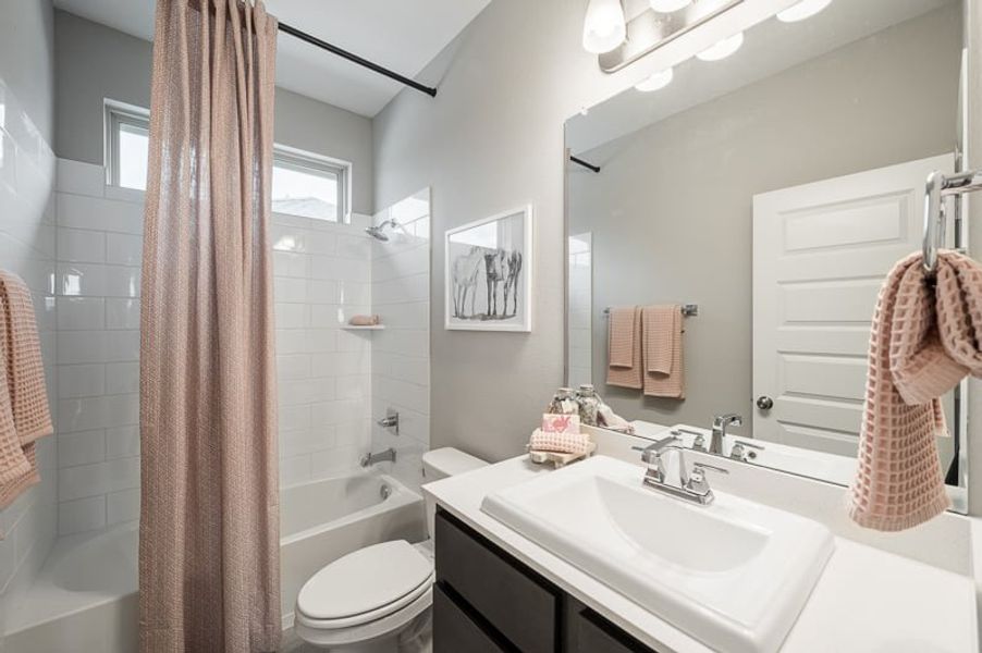 Furnished interior view inside a new home in Woodson’s Reserve 45′, Spring (Image 26).