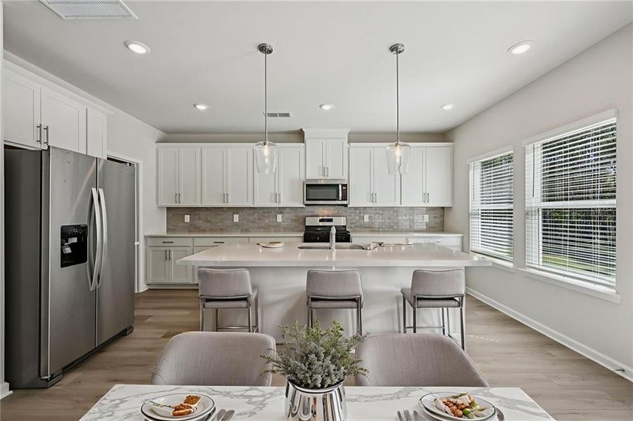 Furnished interior view inside a new home in Parkside at Grayson, Grayson (Image 6).