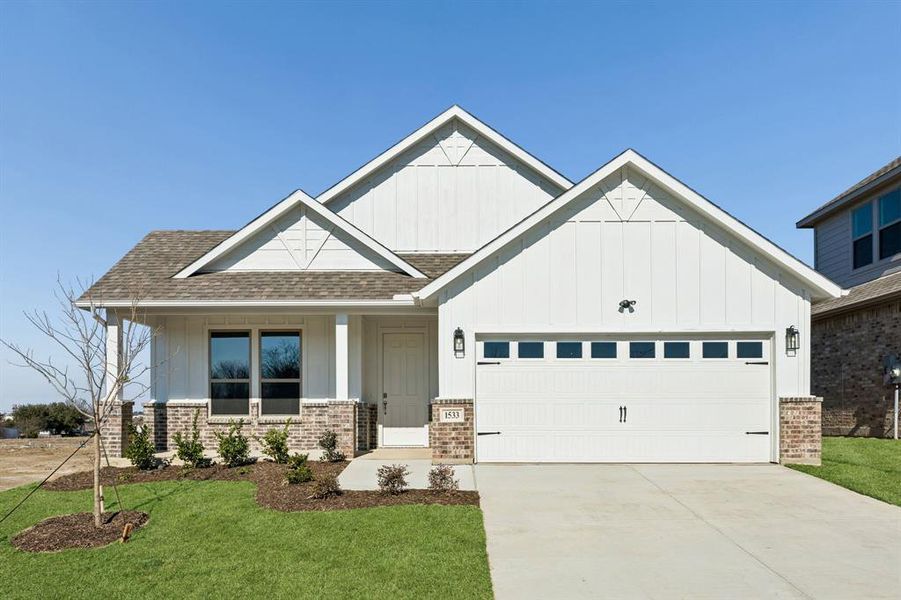 Front exterior of a new home in Freeman Farms, Kaufman, TX, highlighting curb appeal (Image 1). Front exterior of a new home in Freeman Farms, Kaufman, TX, highlighting curb appeal (Image 1).