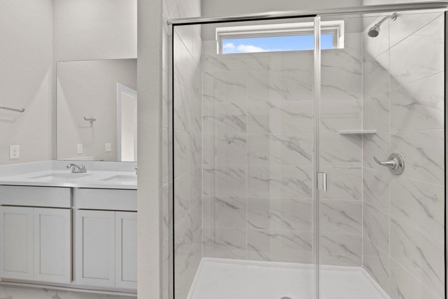 Primary Bath retreat with dual vanities & walk-in shower