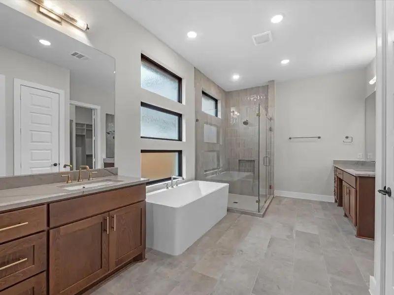Furnished interior view inside a new home in Woodson’s Reserve, Spring (Image 8).