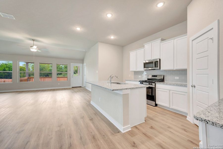 Furnished interior view inside a new home in Winding Brook, San Antonio (Image 13).