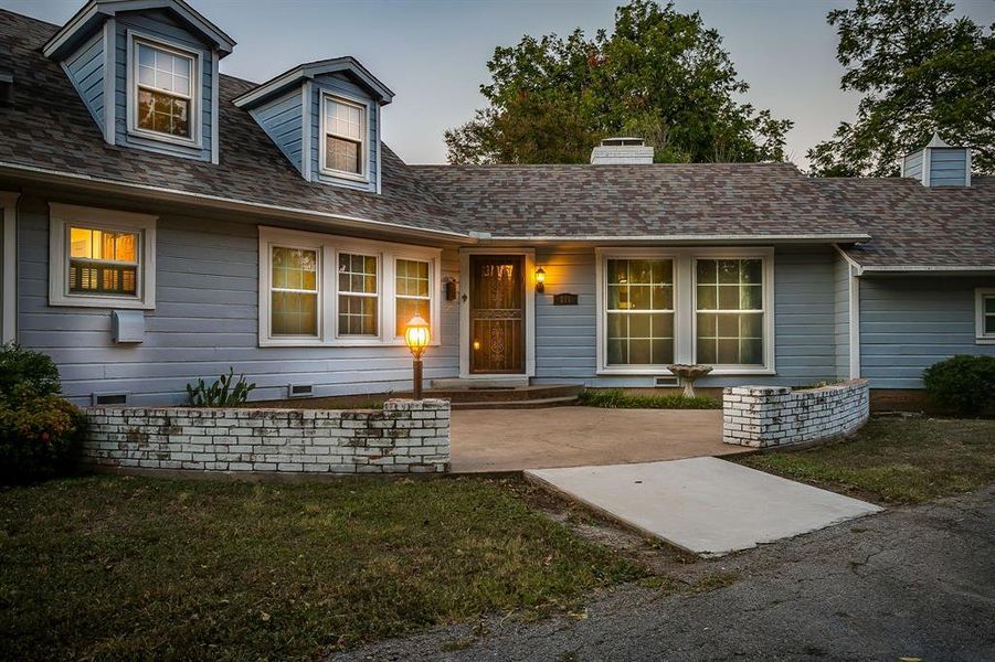 Front exterior of a new home in , Cleburne, TX, highlighting curb appeal (Image 19). Front exterior of a new home in , Cleburne, TX, highlighting curb appeal (Image 19).