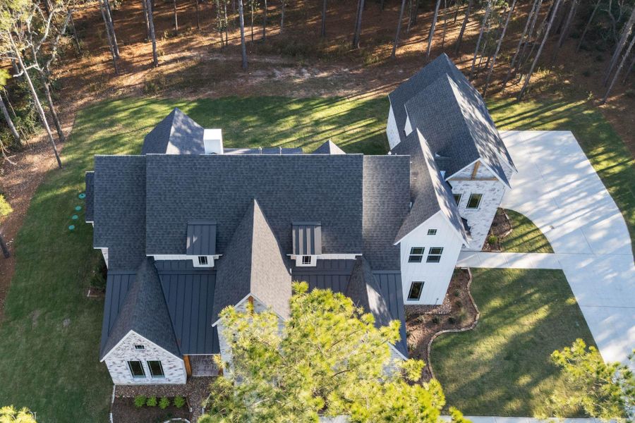 Front exterior of a new home in , Montgomery, TX, highlighting curb appeal (Image 25). Front exterior of a new home in , Montgomery, TX, highlighting curb appeal (Image 25).