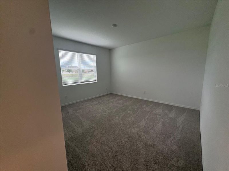 Spacious, unfurnished interior of a new home in Brack Ranch, St. Cloud (Image 17).