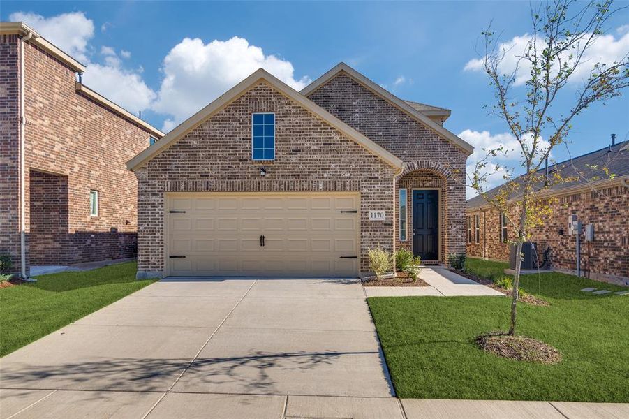 Front exterior of a new home in Walden Pond, Forney, TX, highlighting curb appeal (Image 1). Front exterior of a new home in Walden Pond, Forney, TX, highlighting curb appeal (Image 1).