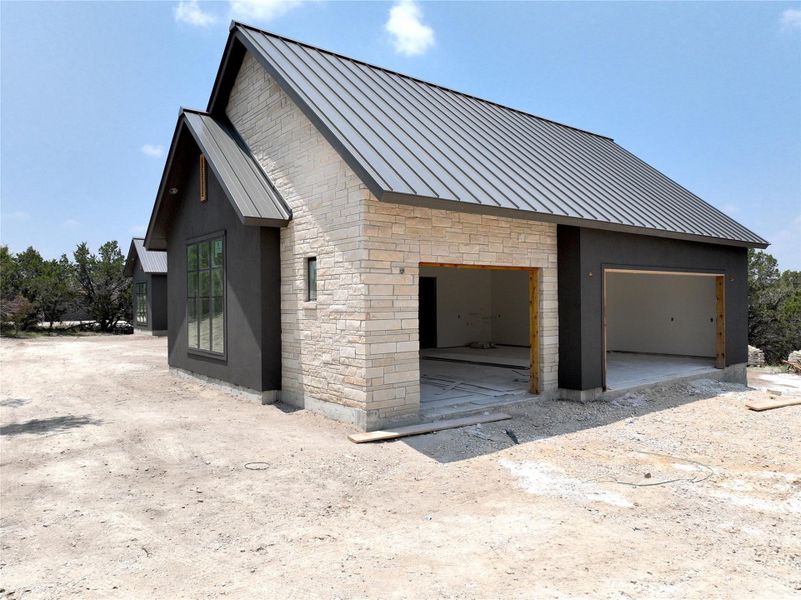 Front exterior of a new home in , Canyon Lake, TX, highlighting curb appeal (Image 12). Front exterior of a new home in , Canyon Lake, TX, highlighting curb appeal (Image 12).
