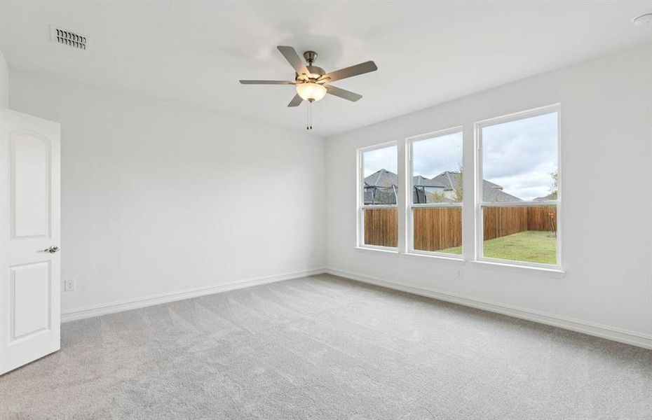 Spacious owner's suite with private bath