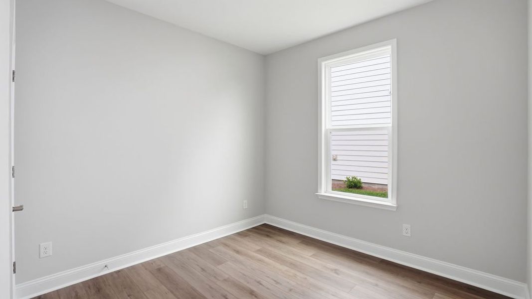 Spacious, unfurnished interior of a new home in Midpoint at New Riverside, Bluffton (Image 21).