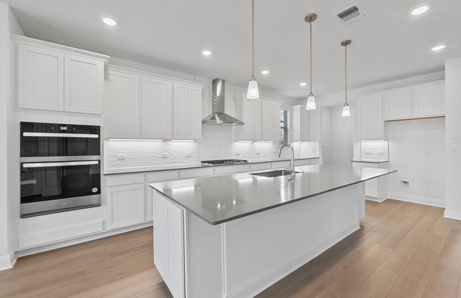 Furnished interior view inside a new home in Bluffview Reserve, Leander (Image 13).