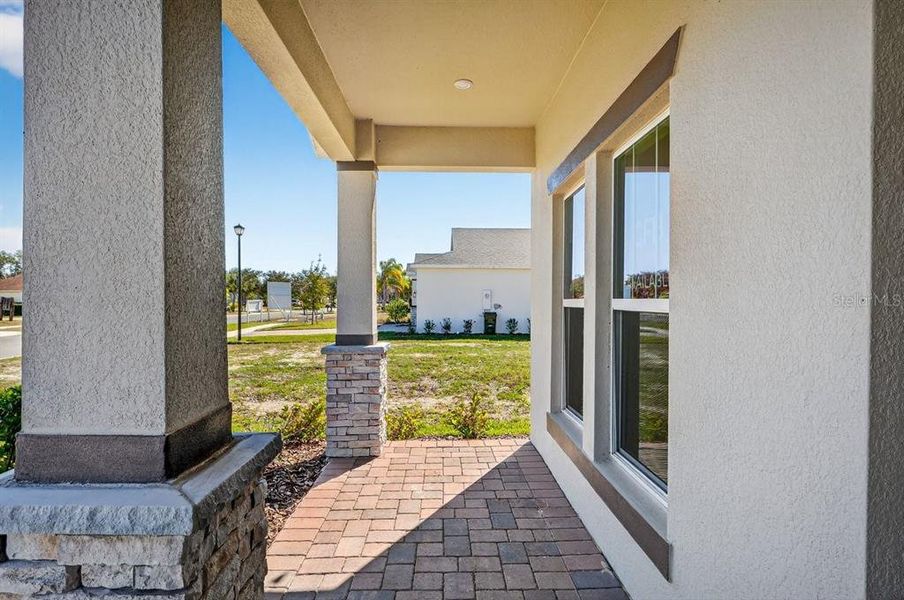 Exterior details and patio area of a home in Gray Hawk at Hole Two, Daytona Beach (Image 30).