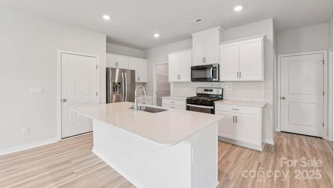 Furnished interior view inside a new home in Cardinal Creek, Charlotte (Image 8).