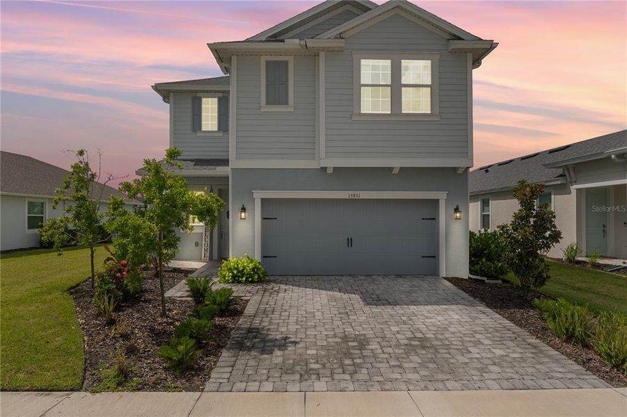 Front exterior of a new home in , Punta Gorda, FL, highlighting curb appeal (Image 2). Front exterior of a new home in , Punta Gorda, FL, highlighting curb appeal (Image 2).