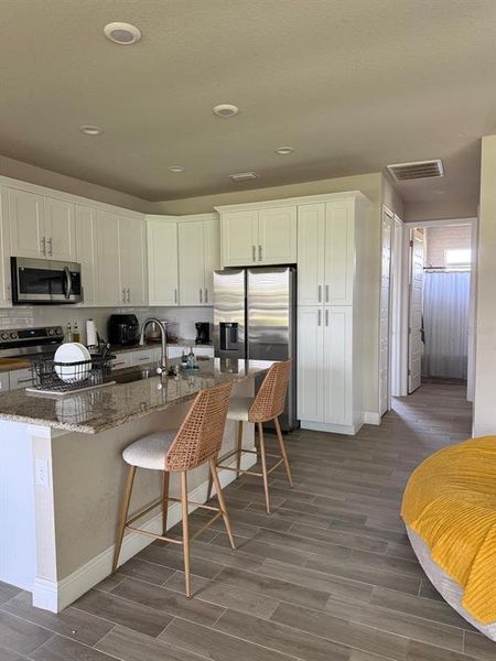 Furnished interior view inside a new home in , Labelle (Image 11).