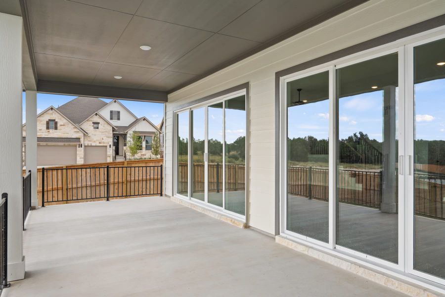 Exterior details and patio area of a home in Lariat, Liberty Hill (Image 25).