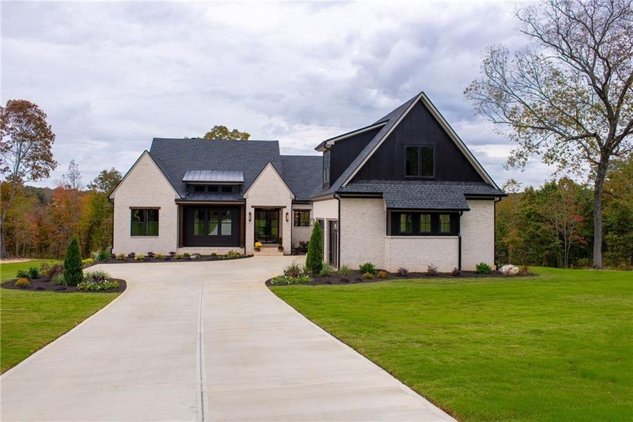 Front exterior of a new home in , Taylorsville, GA, highlighting curb appeal (Image 34). Front exterior of a new home in , Taylorsville, GA, highlighting curb appeal (Image 34).