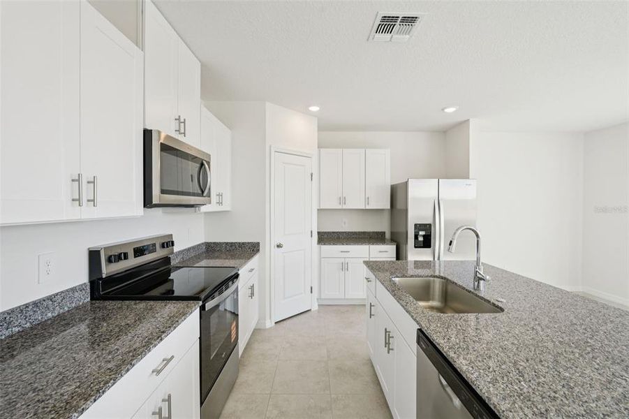 Furnished interior view inside a new home in Crosswinds - Classic Series, Haines City (Image 5).