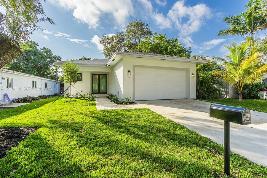 Front exterior of a new home in , Dania Beach, FL, highlighting curb appeal (Image 2). Front exterior of a new home in , Dania Beach, FL, highlighting curb appeal (Image 2).