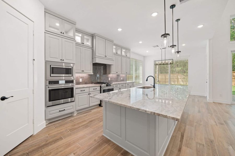 Representative furnished interior of a home built from the Waterloo – 60′ Lot by Chesmar Homes in Lakes of Cane Island, Katy (Image 5).