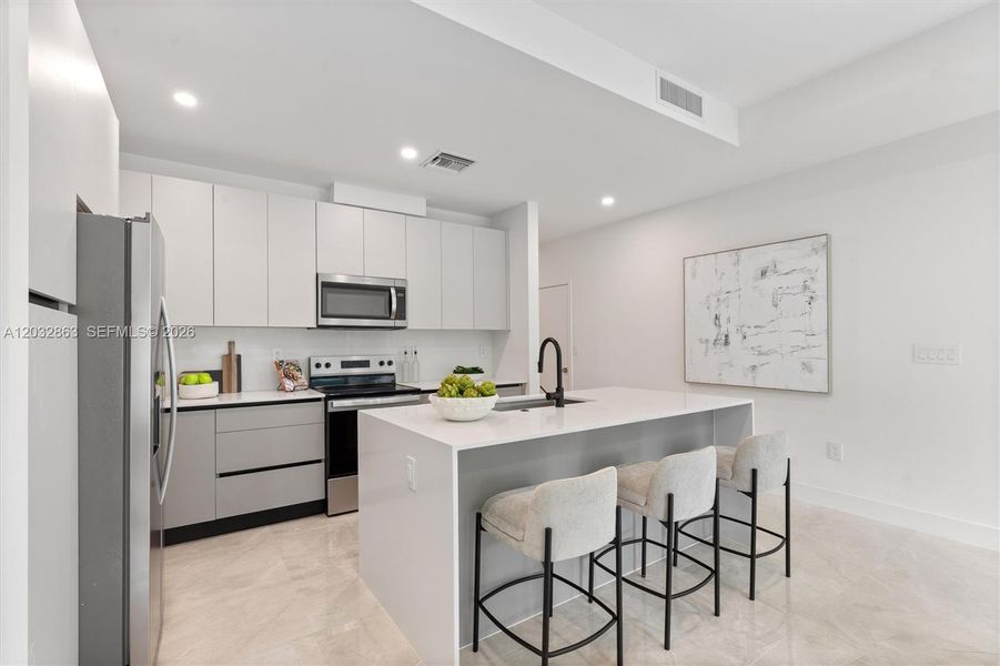 Furnished interior view inside a new home in , Coral Springs (Image 9). Furnished interior view inside a new home in , Coral Springs (Image 9).