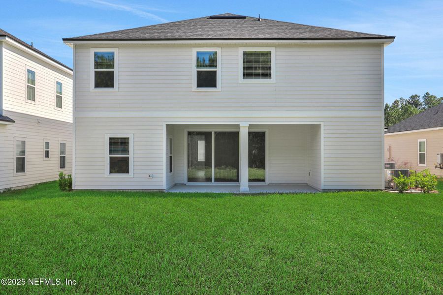 Exterior details and patio area of a home in Silver Landing at SilverLeaf, St. Augustine (Image 21). Exterior details and patio area of a home in Silver Landing at SilverLeaf, St. Augustine (Image 21).