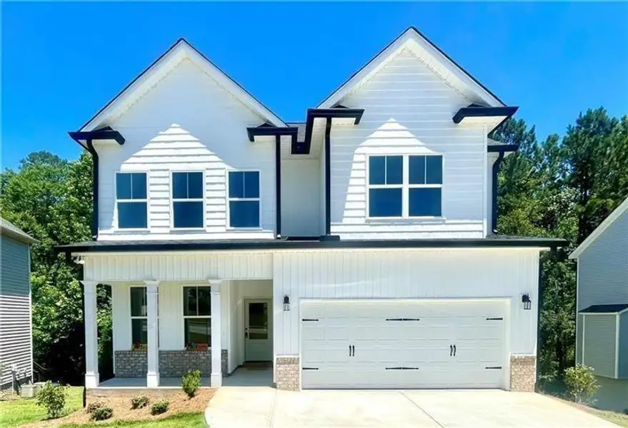Front exterior of a new home in , Rome, GA, highlighting curb appeal (Image 1). Front exterior of a new home in , Rome, GA, highlighting curb appeal (Image 1).