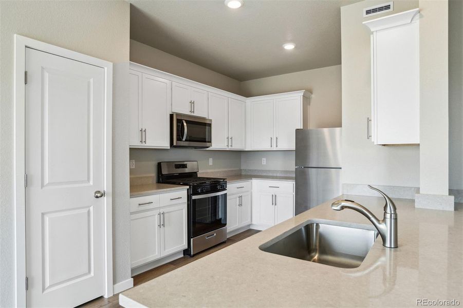 Furnished interior view inside a new home in Bennett Ranch, Bennett (Image 6).