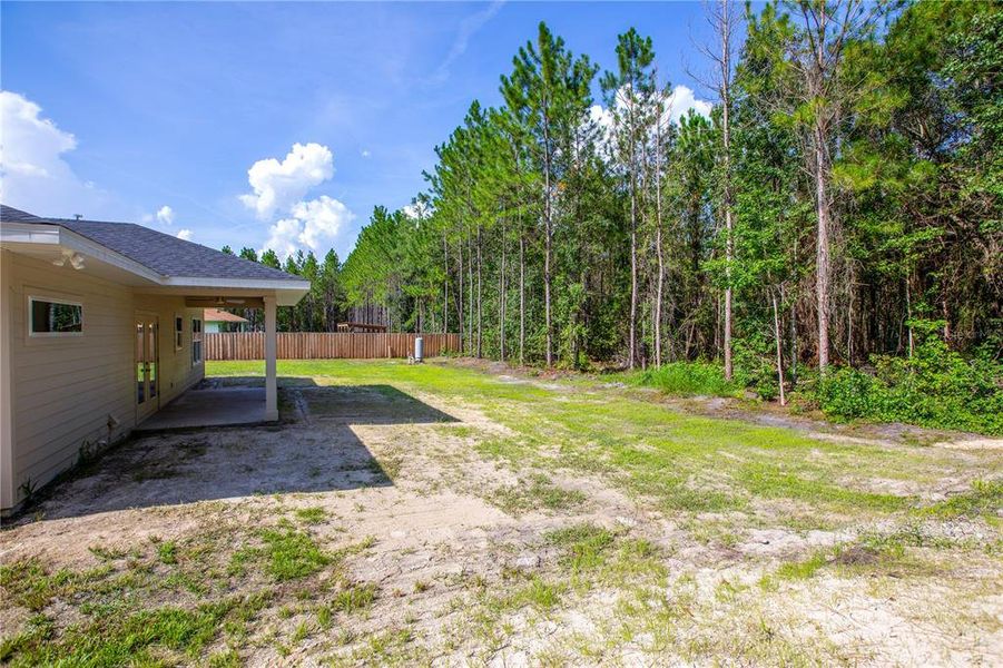 Exterior details and patio area of a home in , Raiford (Image 26).