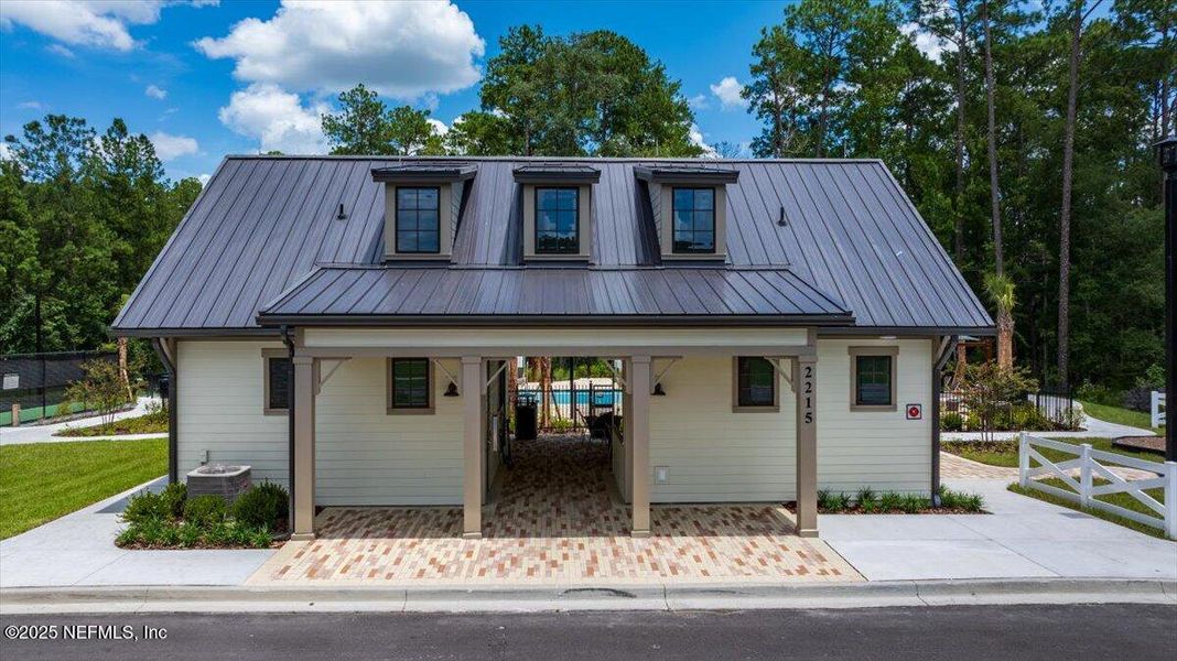 Front exterior of a new home in Jennings Farm, Middleburg, FL, highlighting curb appeal (Image 25). Front exterior of a new home in Jennings Farm, Middleburg, FL, highlighting curb appeal (Image 25).