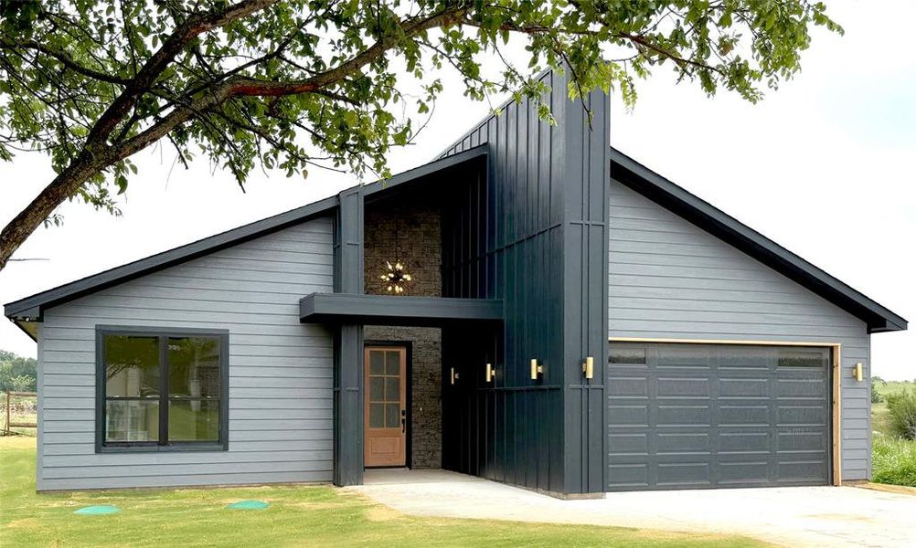 Front exterior of a new home in , Granbury, TX, highlighting curb appeal (Image 1). Front exterior of a new home in , Granbury, TX, highlighting curb appeal (Image 1).