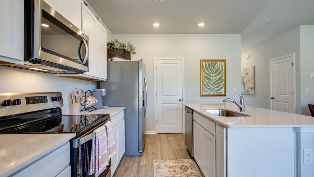 Furnished interior view inside a new home in River Landing Townhomes, Murfreesboro (Image 9).