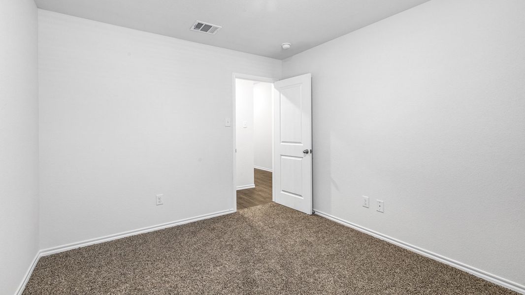 Spacious, unfurnished interior of a new home in Stonewyck Farms, Ennis (Image 21).