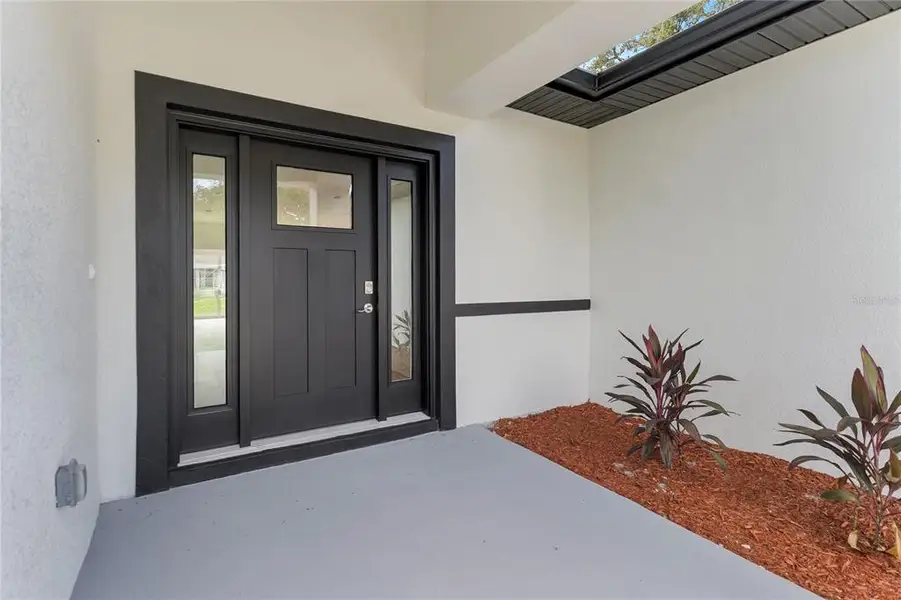 Exterior details and patio area of a home in , Palm Bay (Image 3).