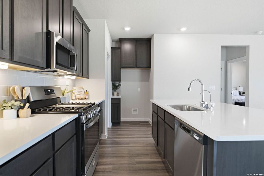 Furnished interior view inside a new home in August Fields, New Braunfels (Image 6).