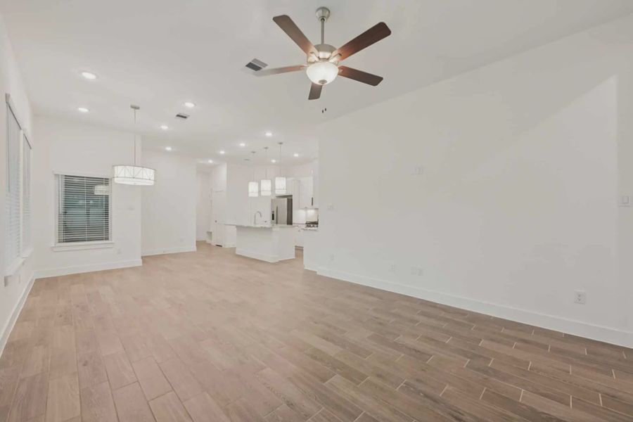 Representative unfurnished interior of a home built from the Pommery by Chesmar Homes in Kresston, Montgomery (Image 5).