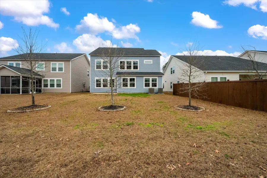 Exterior details and patio area of a home in Limehouse Village: Arbor Series, Summerville (Image 4). Exterior details and patio area of a home in Limehouse Village: Arbor Series, Summerville (Image 4).