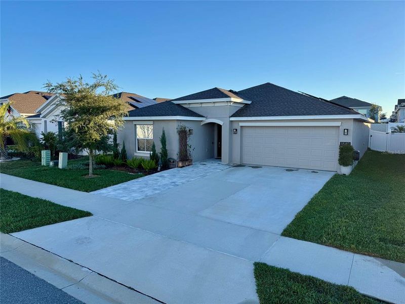 Front exterior of a new home in , Groveland, FL, highlighting curb appeal (Image 1). Front exterior of a new home in , Groveland, FL, highlighting curb appeal (Image 1).
