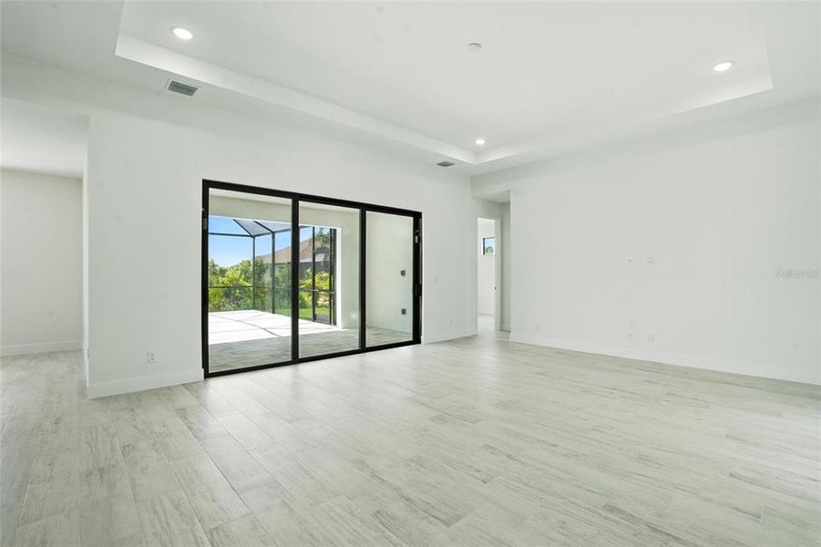 Spacious, unfurnished interior of a new home in , Port Charlotte (Image 33).