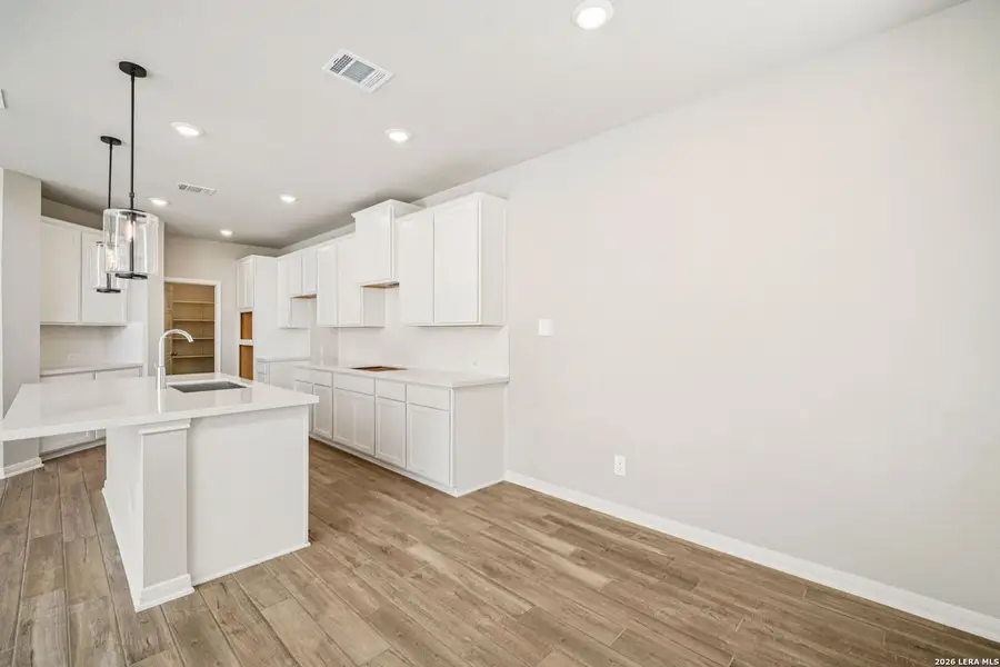 Furnished interior view inside a new home in Estancia Ranch - Classic Series, San Antonio (Image 7).