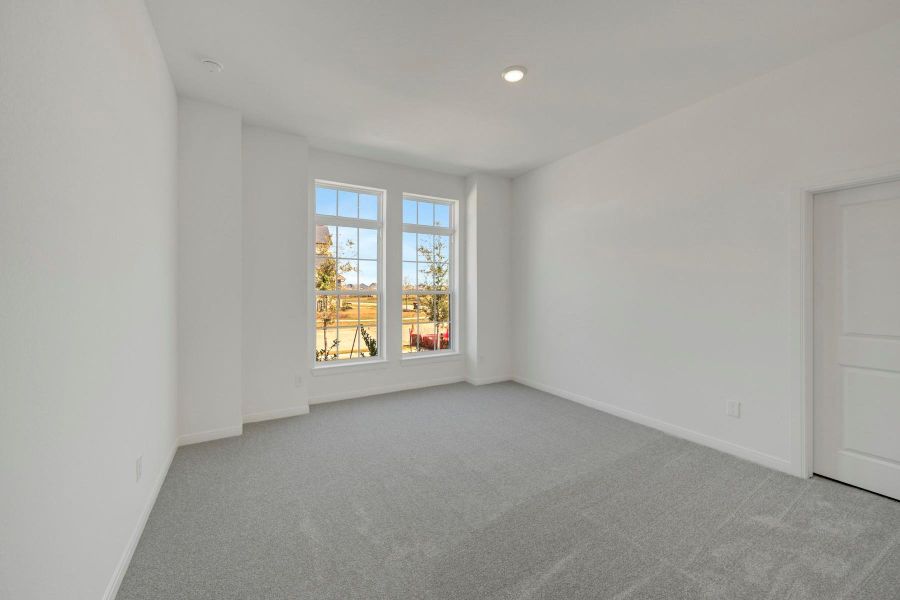 Spacious, unfurnished interior of a new home in The Grand Prairie 50’, Hockley (Image 25).