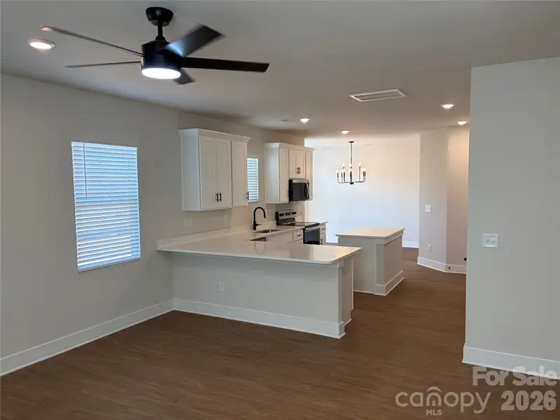 Furnished interior view inside a new home in , Lenoir (Image 4).