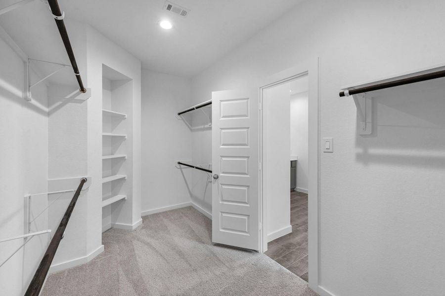 Furnished interior view inside a new home in Grand Mason Crossing, Katy (Image 9).