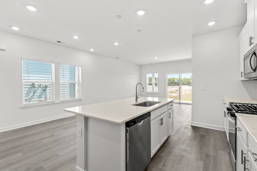 Furnished interior view inside a new home in Waterside - Boardwalk Series, Longs (Image 6).